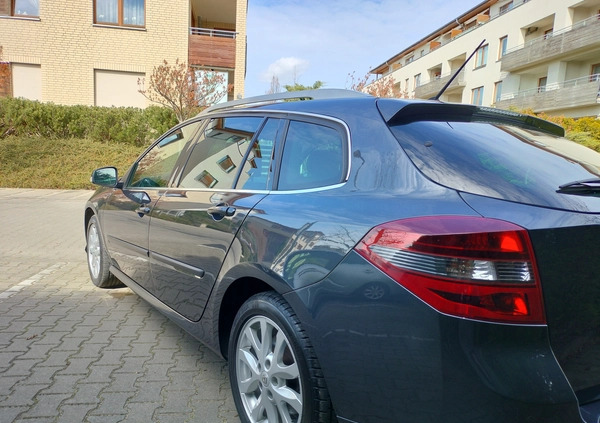 Renault Laguna cena 21900 przebieg: 195000, rok produkcji 2010 z Szczecin małe 301